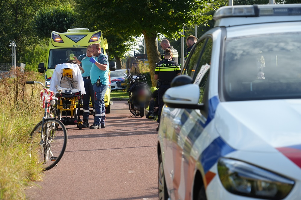 Fietser gewond na botsing met scooterrijder