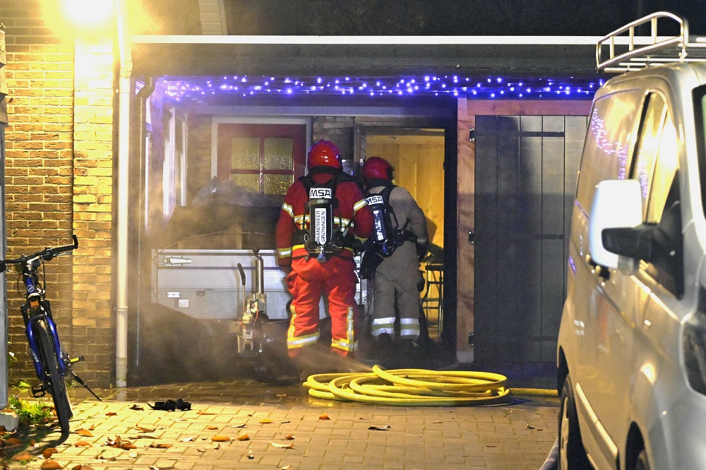 Woningbrand na kortsluiting, bewoners ongedeerd