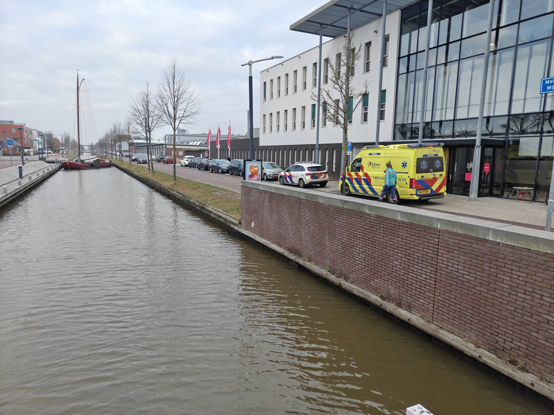 Fietser haalt nat pak