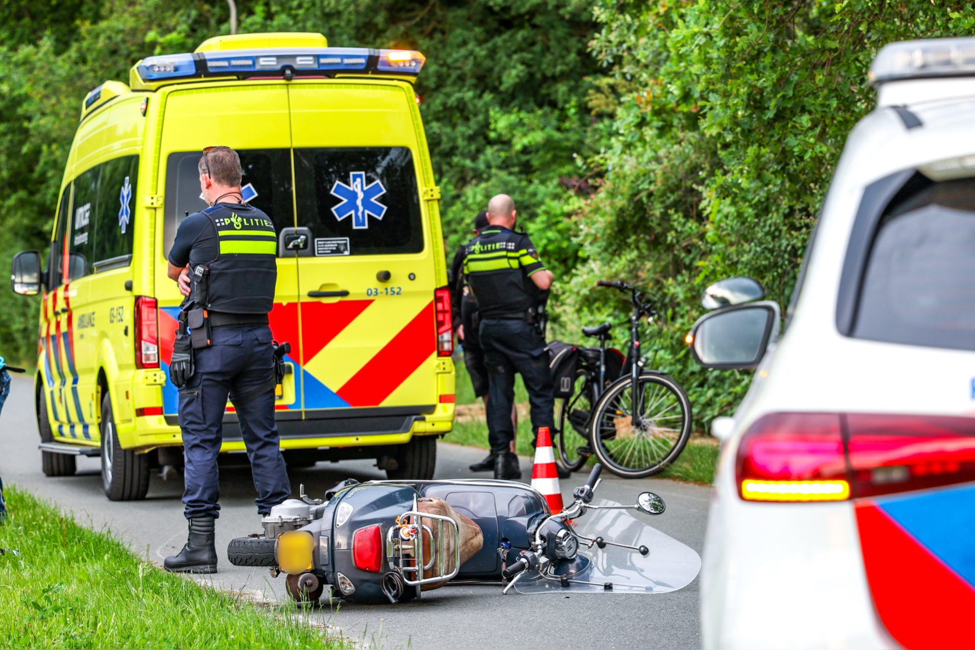 Scooterrijder gewond na botsing met fietser